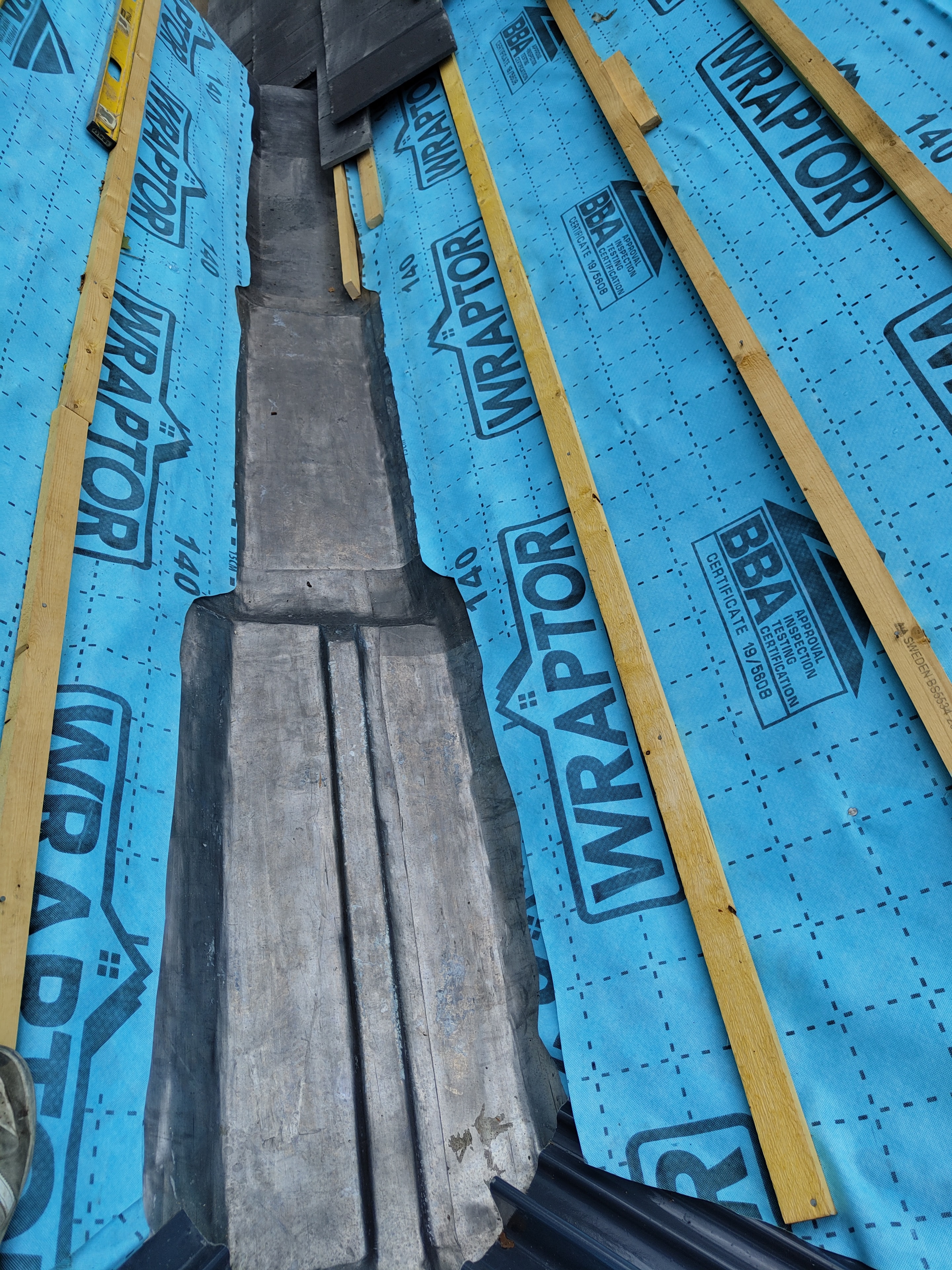 New slate roof installation